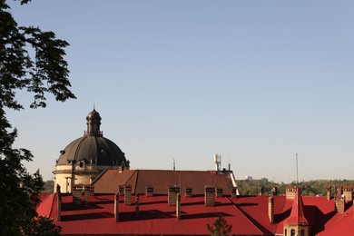 Photo of Beautiful buildings and trees under blue sky outdoors