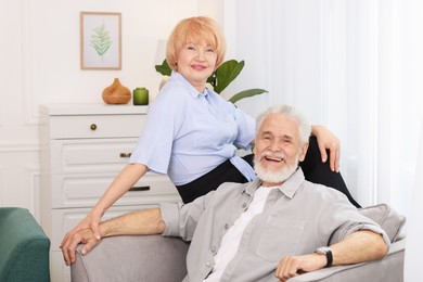 Photo of Lovely senior couple spending time together at home