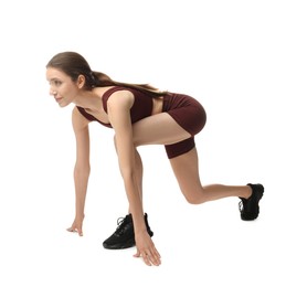 Photo of Runner in starting position on white background