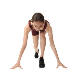 Photo of Runner in starting position on white background