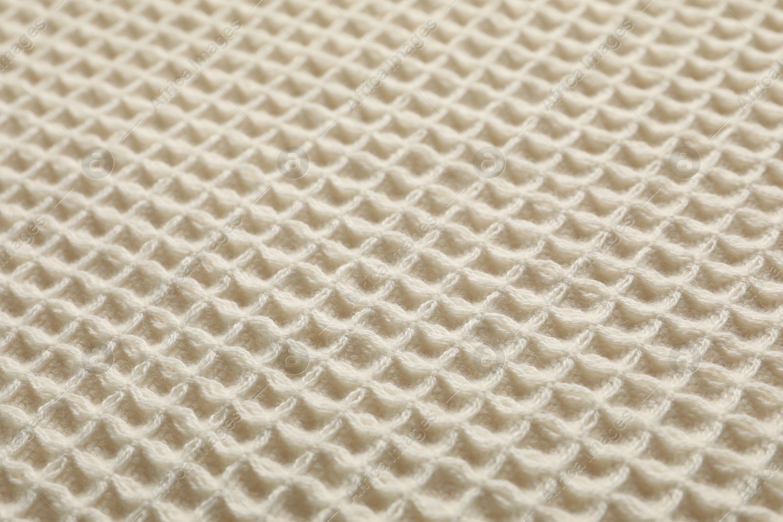 Clean beige waffle towel as background, closeup Photo of Clean beige waffle towel as background, closeup