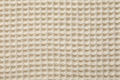 Photo of Clean beige waffle towel as background, top view