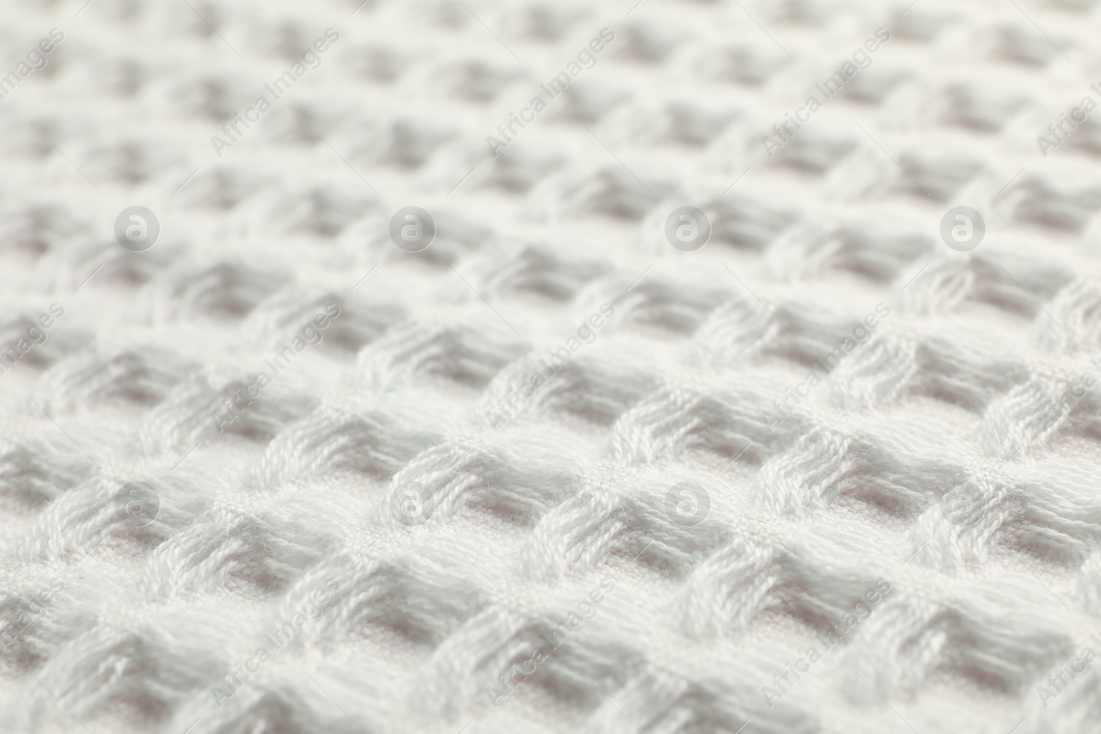 Clean white waffle towel as background, closeup Photo of Clean white waffle towel as background, closeup