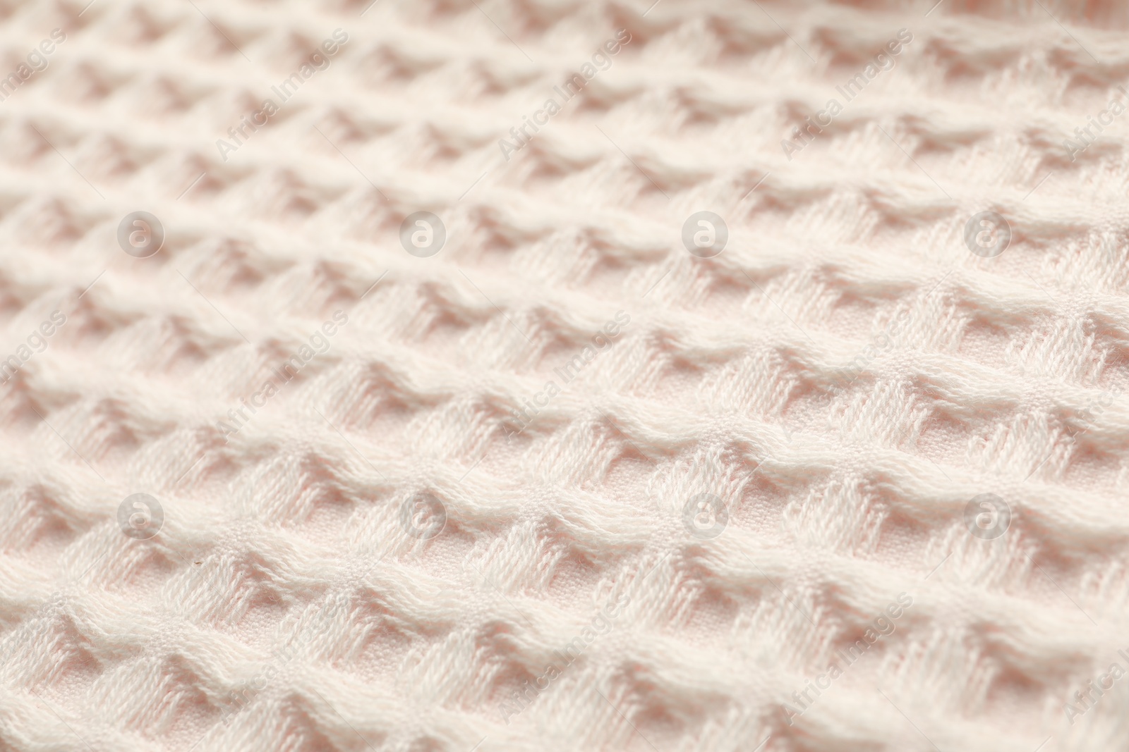 Clean beige waffle towel as background, closeup Photo of Clean beige waffle towel as background, closeup