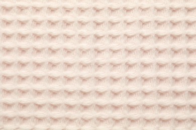 Photo of Clean beige waffle towel as background, top view