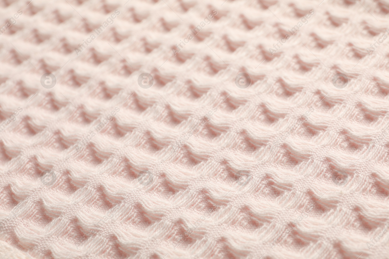 Clean beige waffle towel as background, closeup Photo of Clean beige waffle towel as background, closeup
