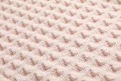 Photo of Clean beige waffle towel as background, closeup