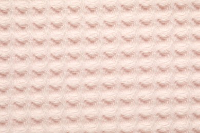 Photo of Clean beige waffle towel as background, top view