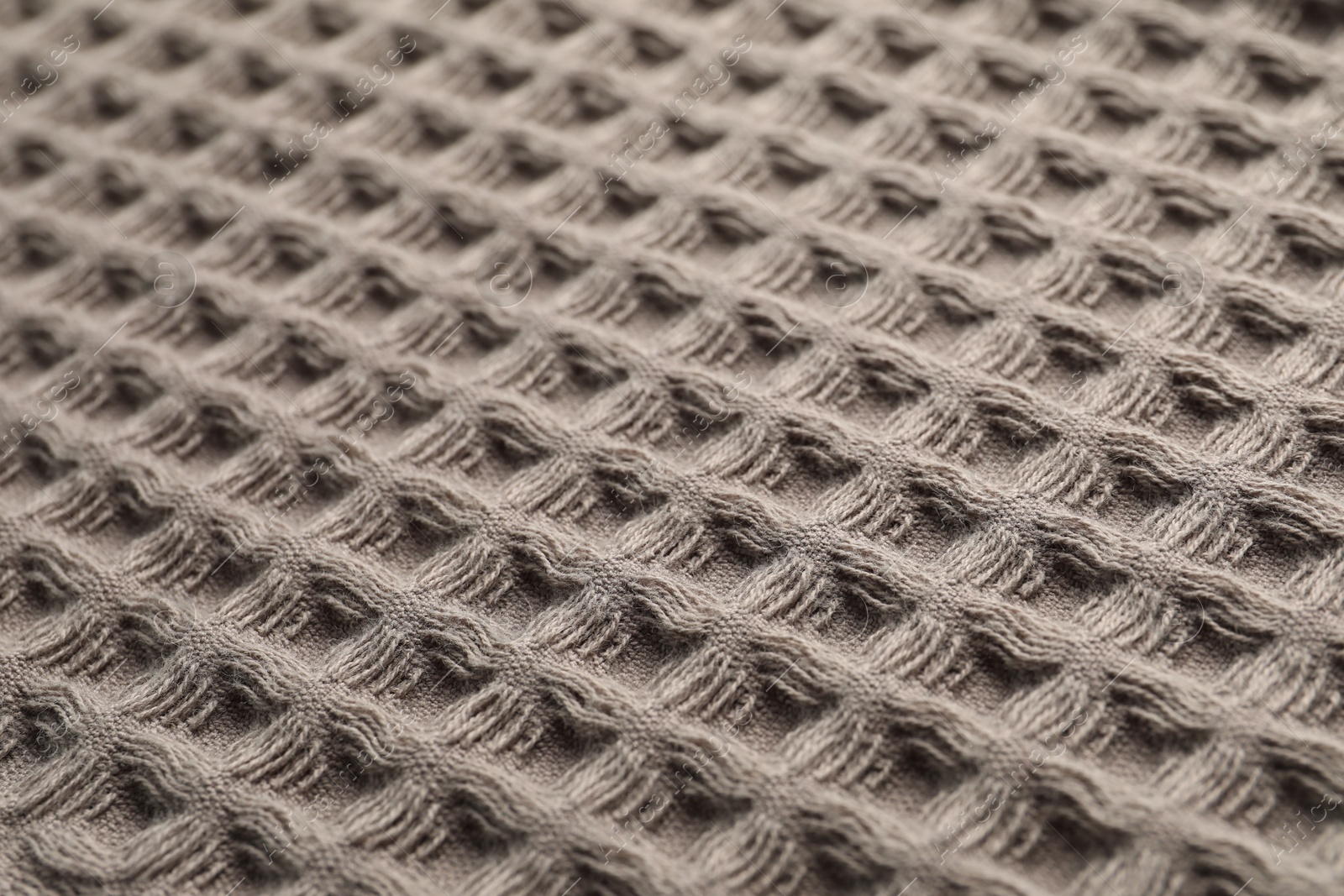 Clean brown waffle towel as background, closeup Photo of Clean brown waffle towel as background, closeup