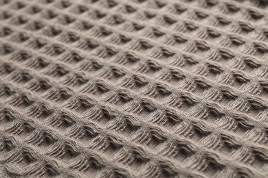Photo of Clean brown waffle towel as background, closeup