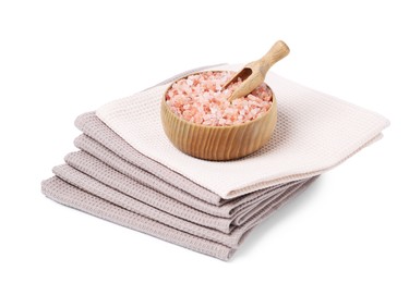 Photo of Clean waffle towels and sea salt isolated on white