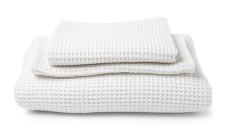 Photo of Stack of clean waffle towels isolated on white