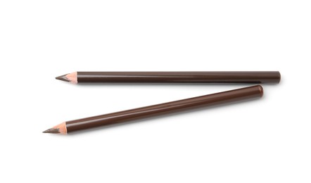 Photo of Different eyebrow pencils isolated on white, top view