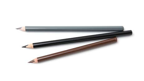 Photo of Different eyebrow pencils isolated on white, top view