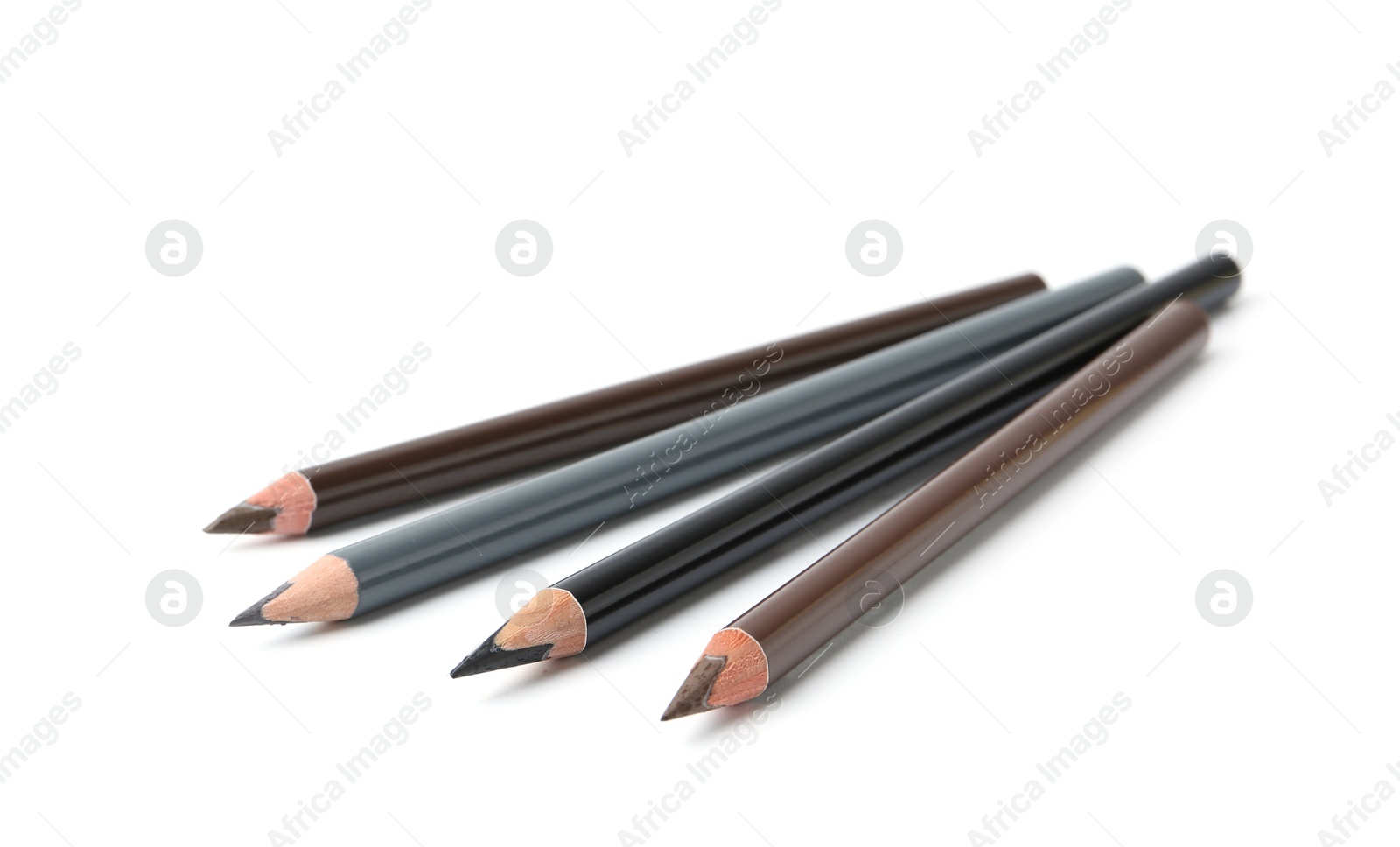 Many different eyebrow pencils isolated on white Photo of Many different eyebrow pencils isolated on white