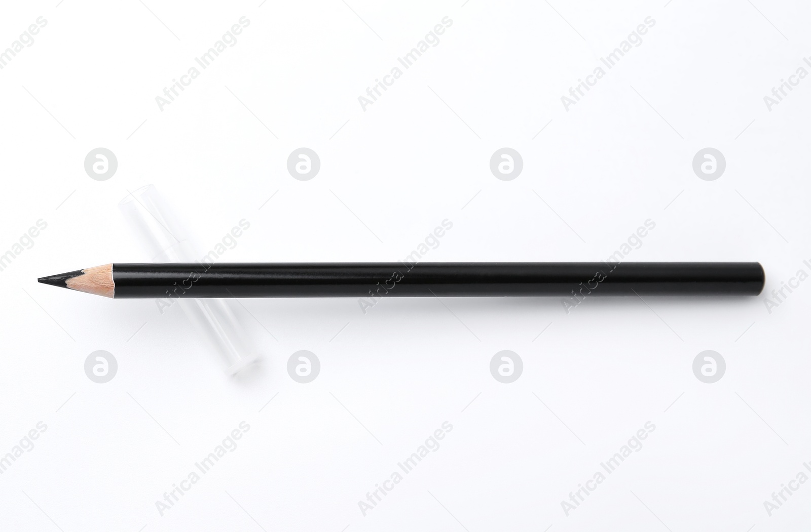 Black eyebrow pencil on white background, top view Photo of Black eyebrow pencil on white background, top view