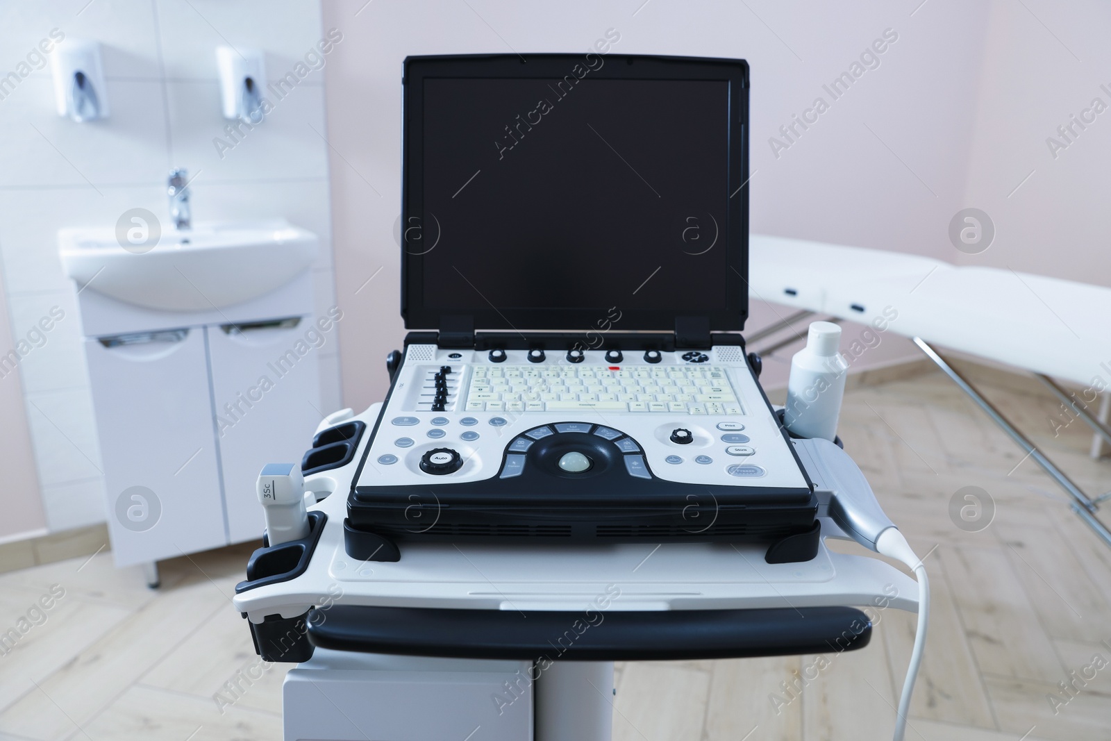 Modern ultrasound machine in clinic. Medical equipment Photo of Modern ultrasound machine in clinic. Medical equipment