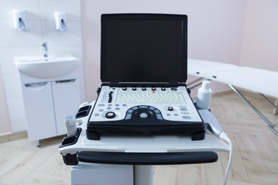 Photo of Modern ultrasound machine in clinic. Medical equipment