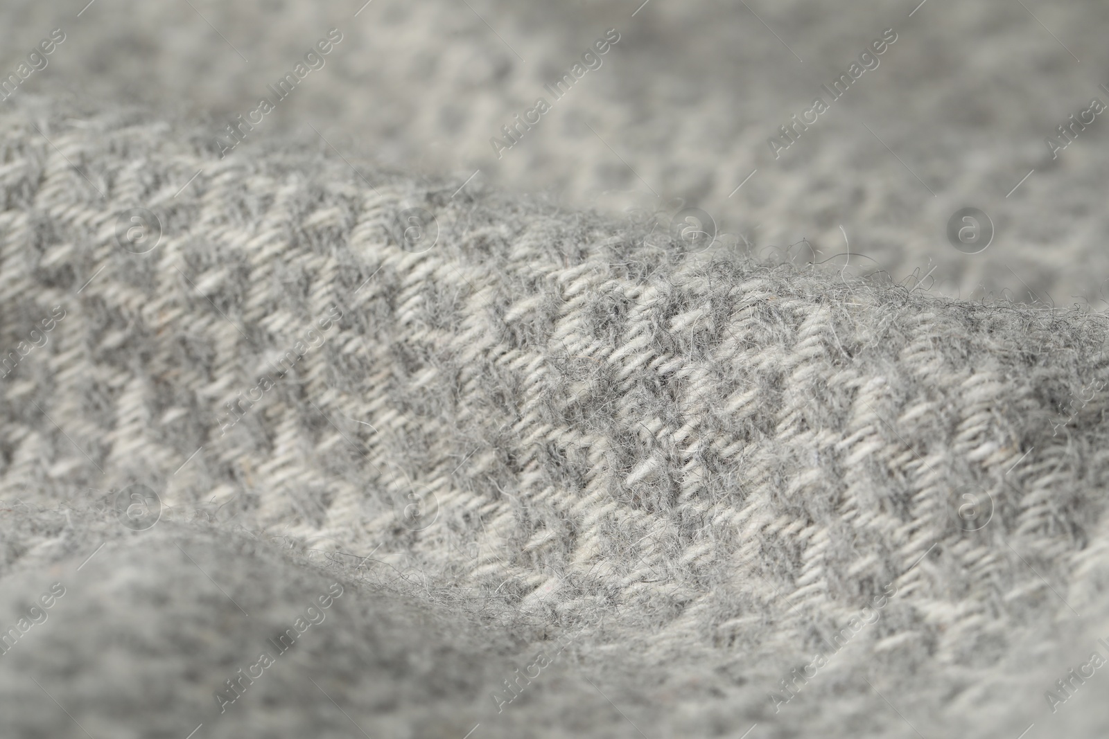 Texture of light grey wool fabric as background, closeup Photo of Texture of light grey wool fabric as background, closeup