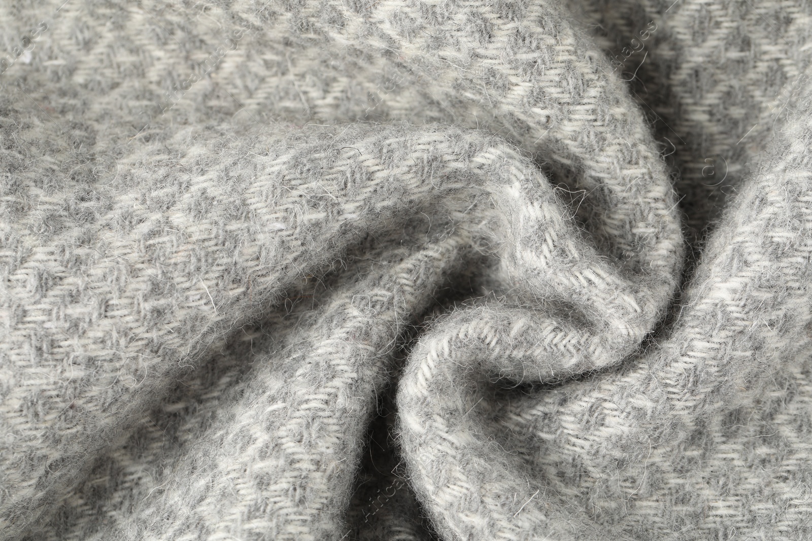 Texture of light grey wool fabric as background, top view Photo of Texture of light grey wool fabric as background, top view