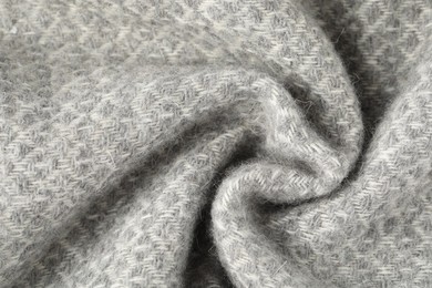 Photo of Texture of light grey wool fabric as background, top view