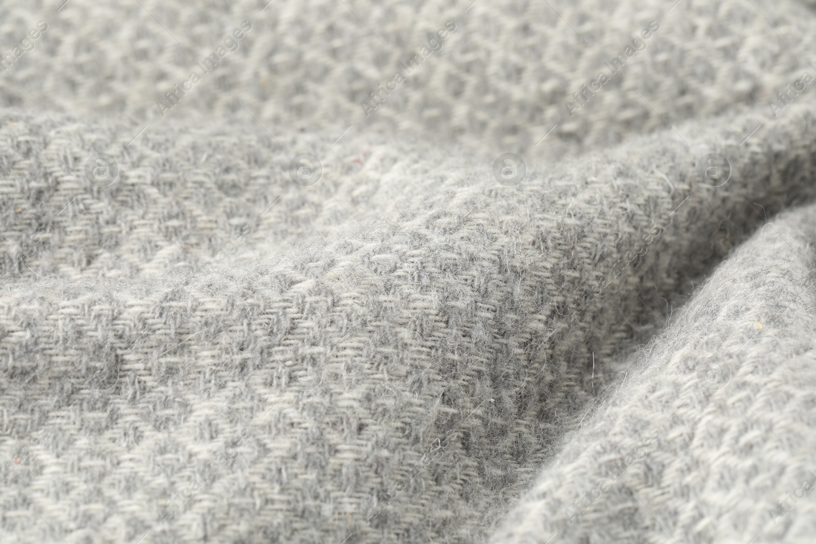 Texture of light grey wool fabric as background, closeup Photo of Texture of light grey wool fabric as background, closeup