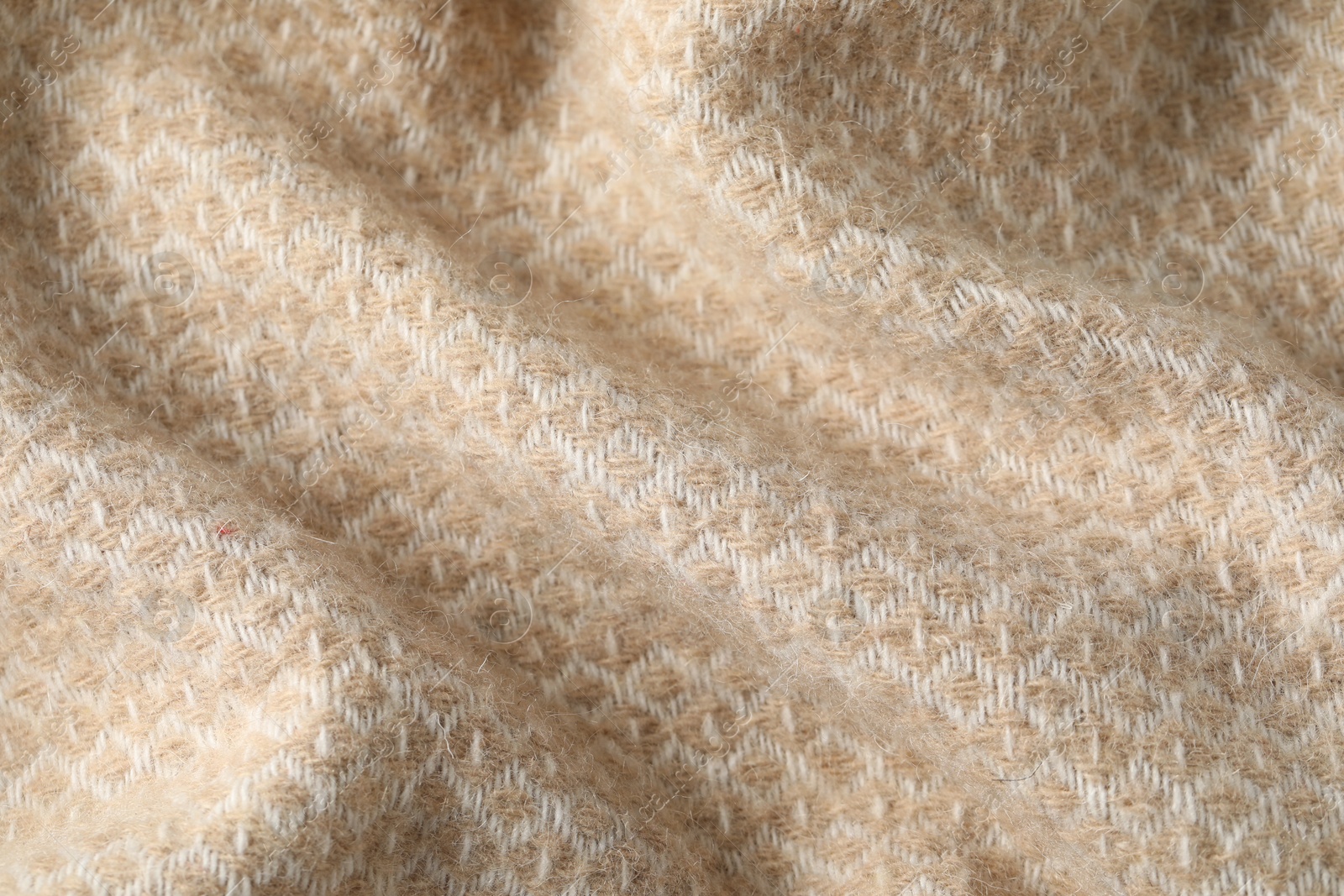 Texture of beige wool fabric as background, top view Photo of Texture of beige wool fabric as background, top view