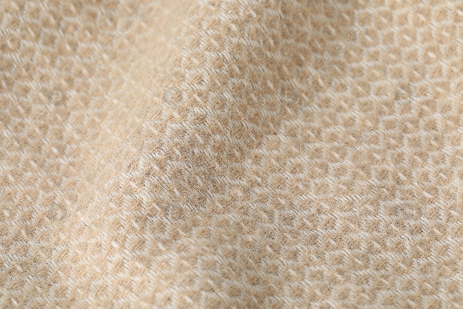 Texture of beige wool fabric as background, closeup Photo of Texture of beige wool fabric as background, closeup