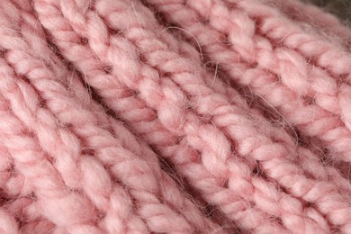 Photo of Texture of pink wool fabric as background, top view