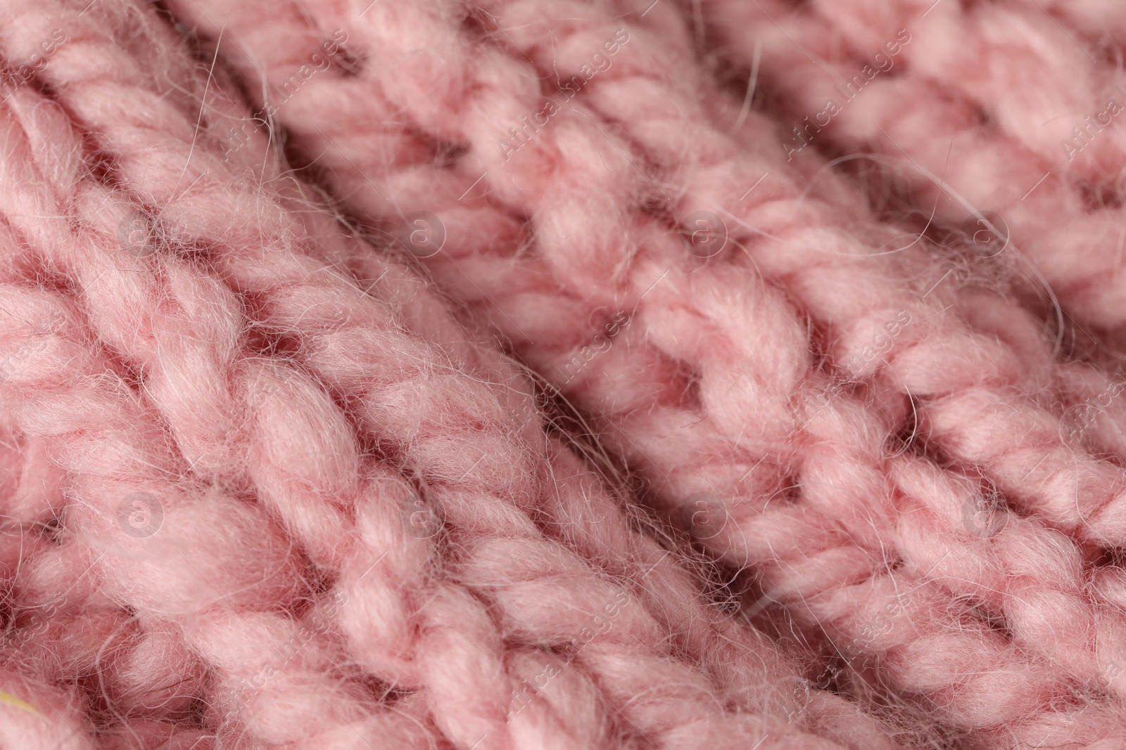 Texture of pink wool fabric as background, closeup Photo of Texture of pink wool fabric as background, closeup