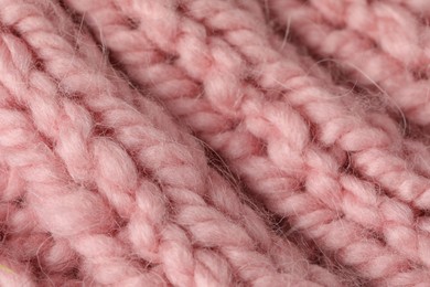 Photo of Texture of pink wool fabric as background, closeup
