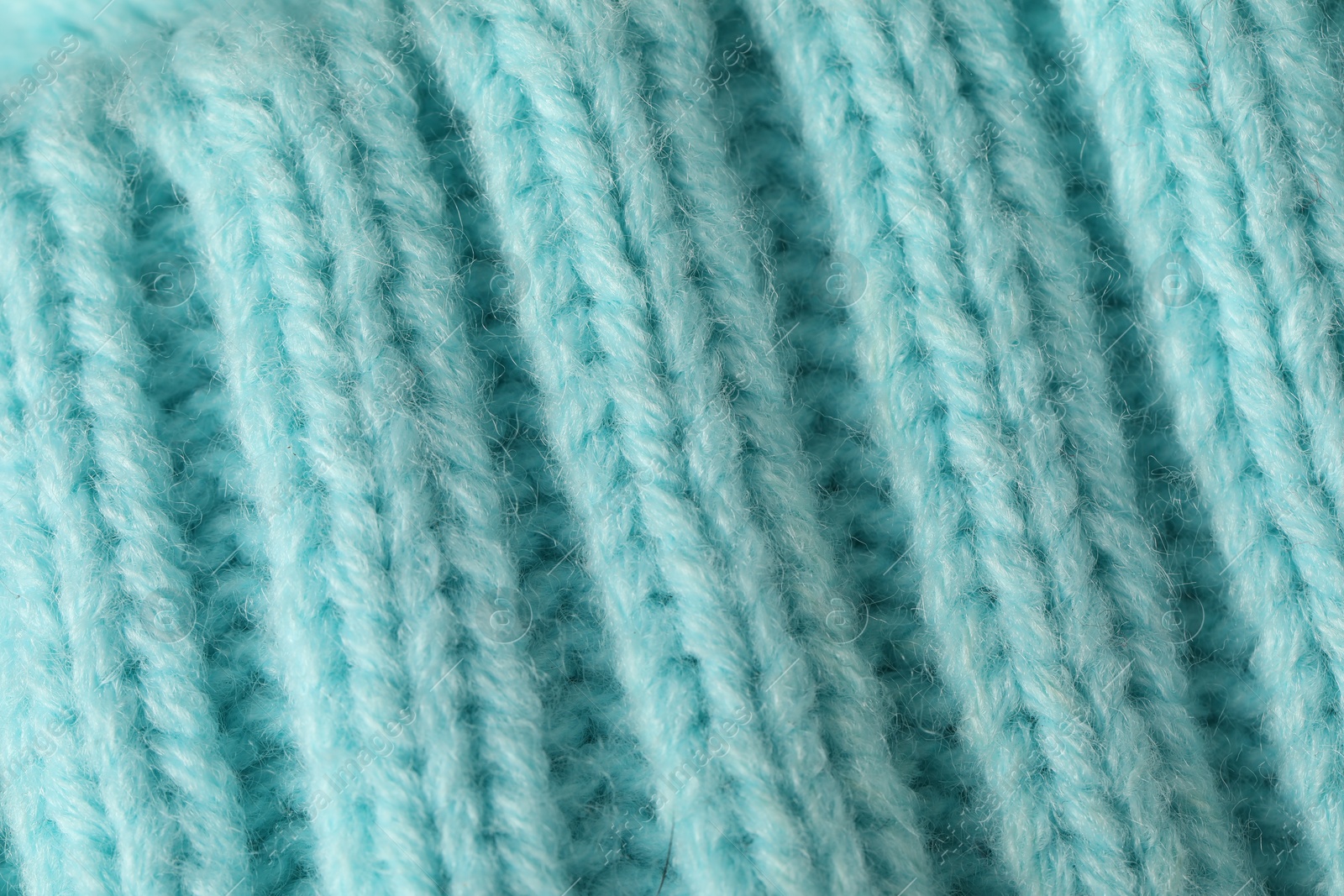 Texture of turquoise wool fabric as background, top view Photo of Texture of turquoise wool fabric as background, top view