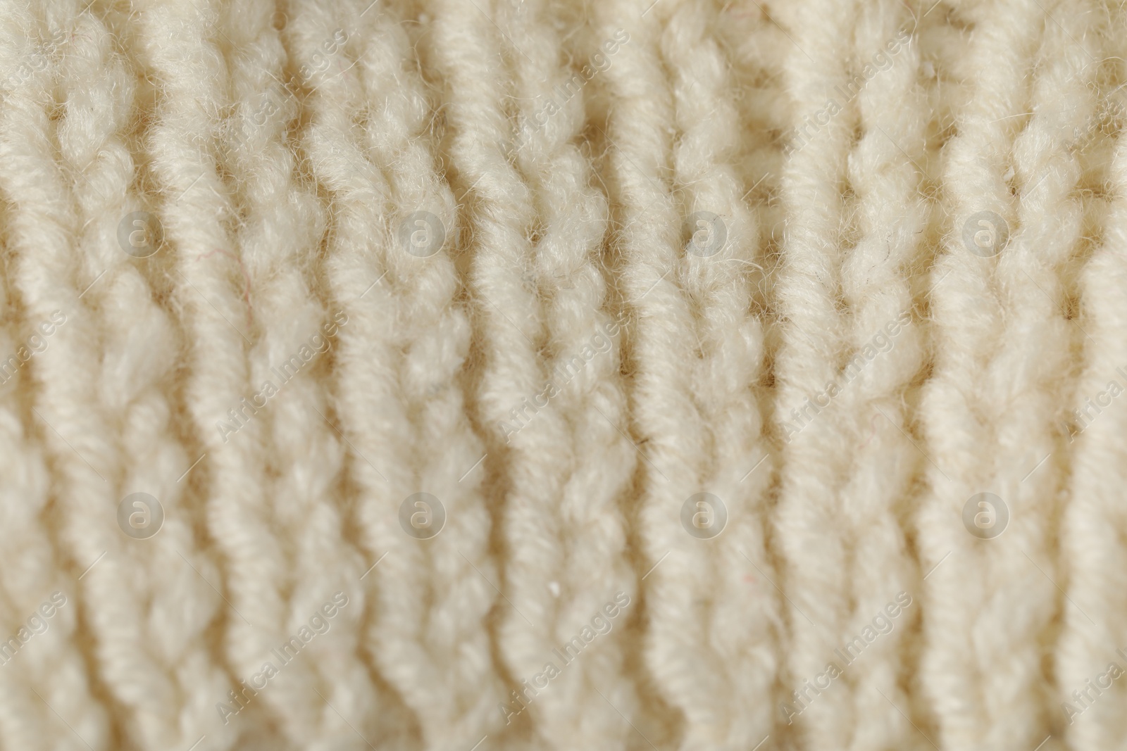 Texture of beige wool fabric as background, closeup Photo of Texture of beige wool fabric as background, closeup