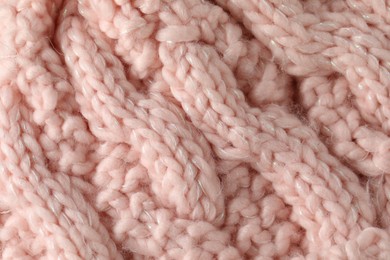 Photo of Texture of pink wool fabric as background, top view