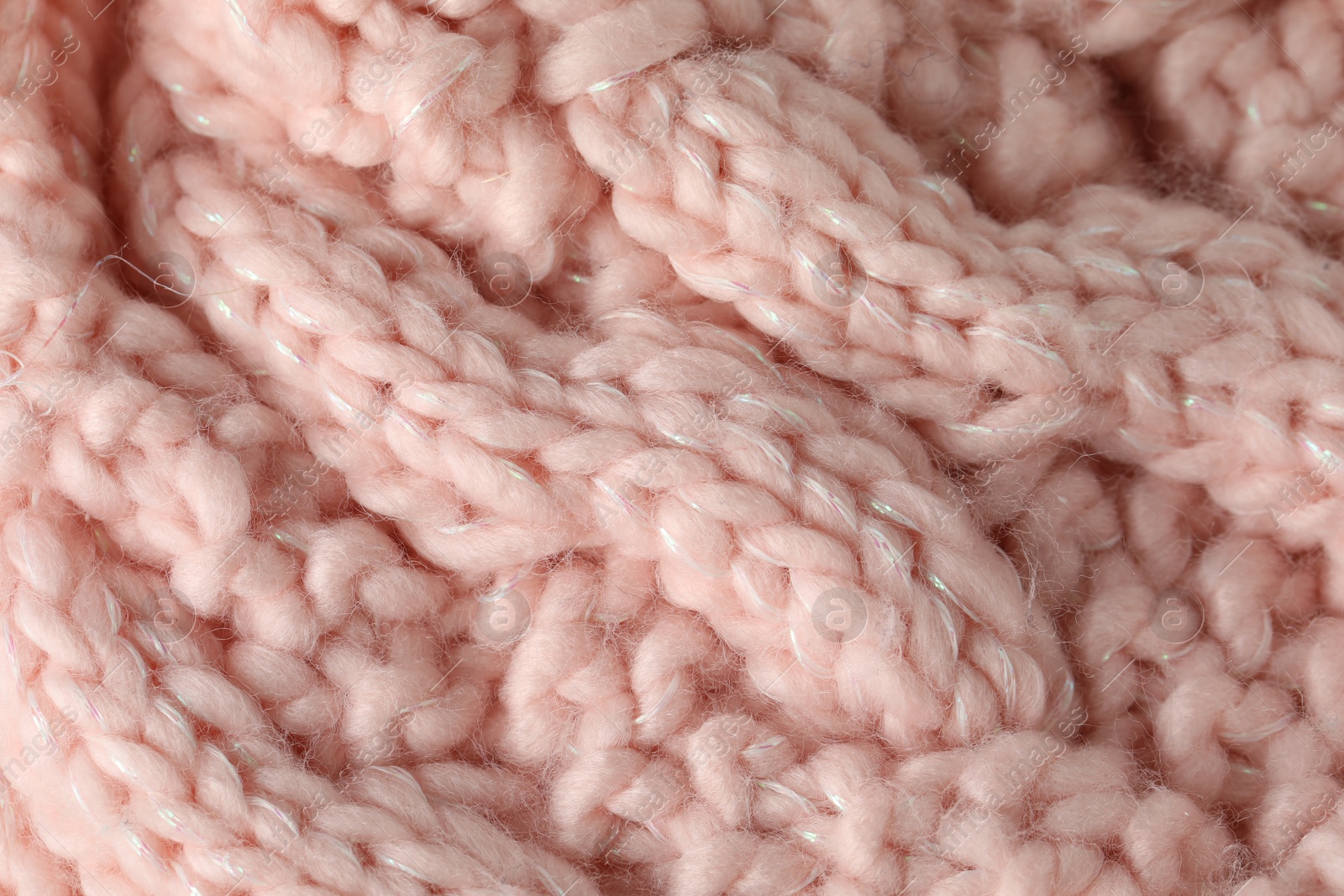 Photo of Texture of pink wool fabric as background, top view