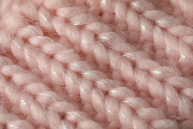 Photo of Texture of pink wool fabric as background, closeup
