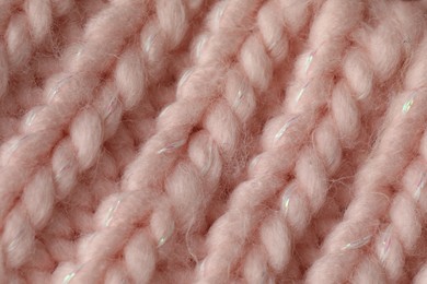 Photo of Texture of pink wool fabric as background, top view