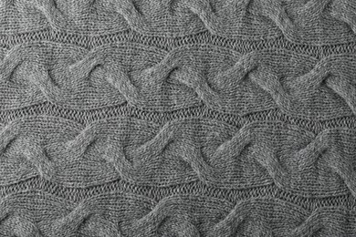 Photo of Texture of grey wool fabric as background, top view