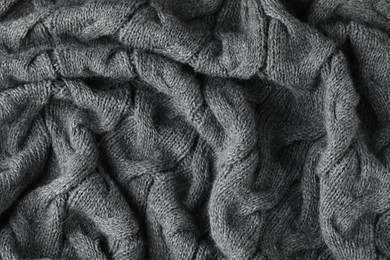Photo of Texture of grey wool fabric as background, closeup