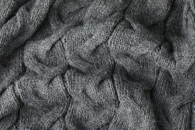 Photo of Texture of grey wool fabric as background, closeup