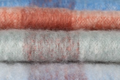 Photo of Texture of colorful wool fabric as background, closeup