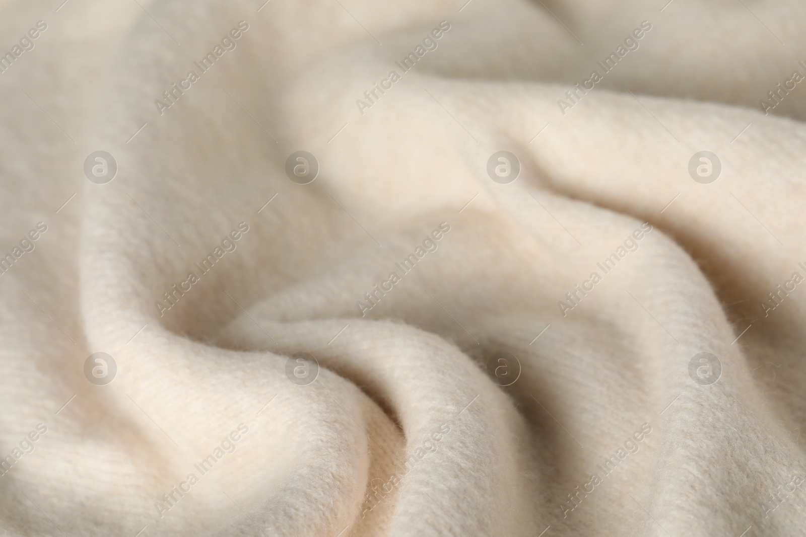 Texture of beige wool fabric as background, closeup Photo of Texture of beige wool fabric as background, closeup