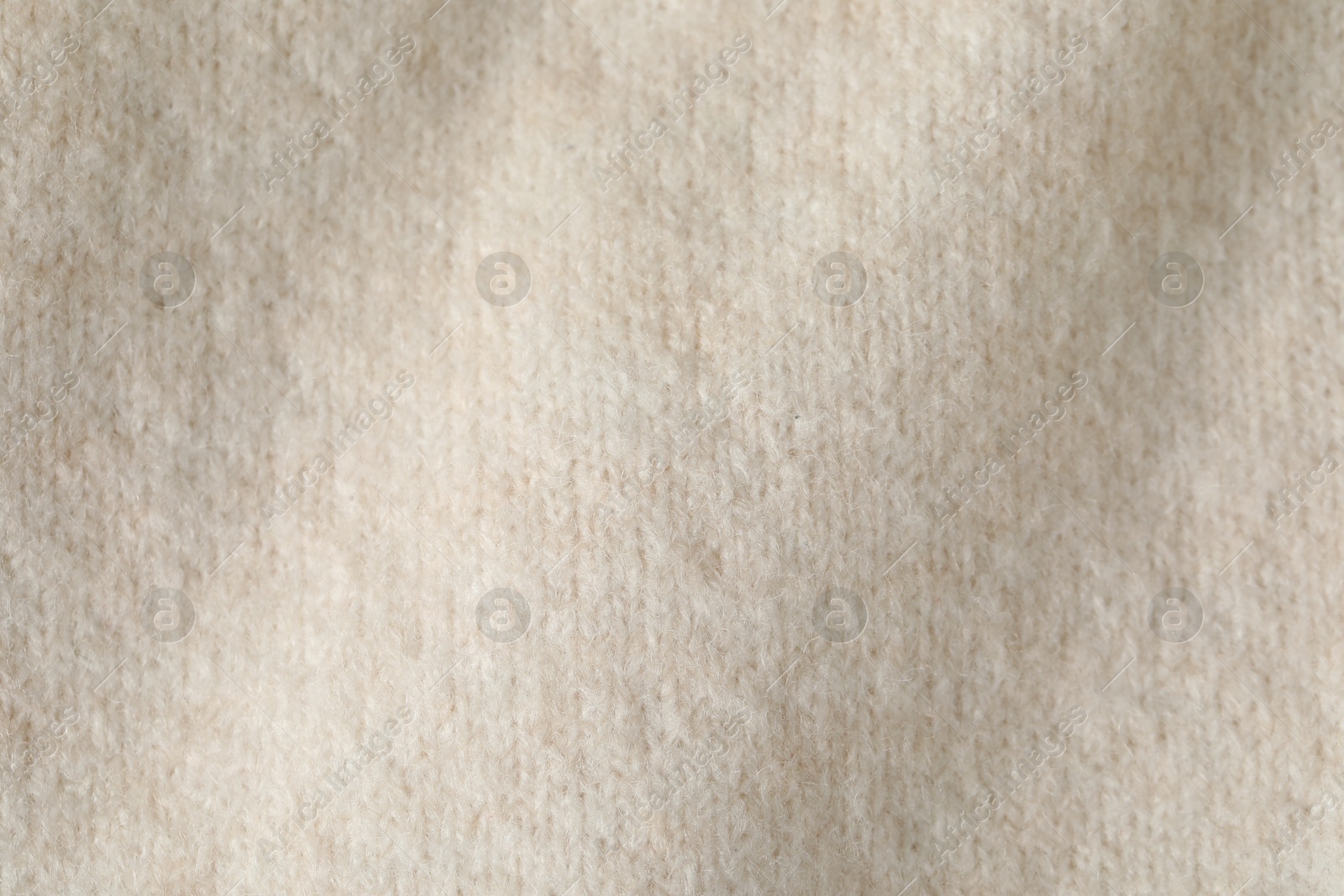Texture of beige wool fabric as background, top view Photo of Texture of beige wool fabric as background, top view