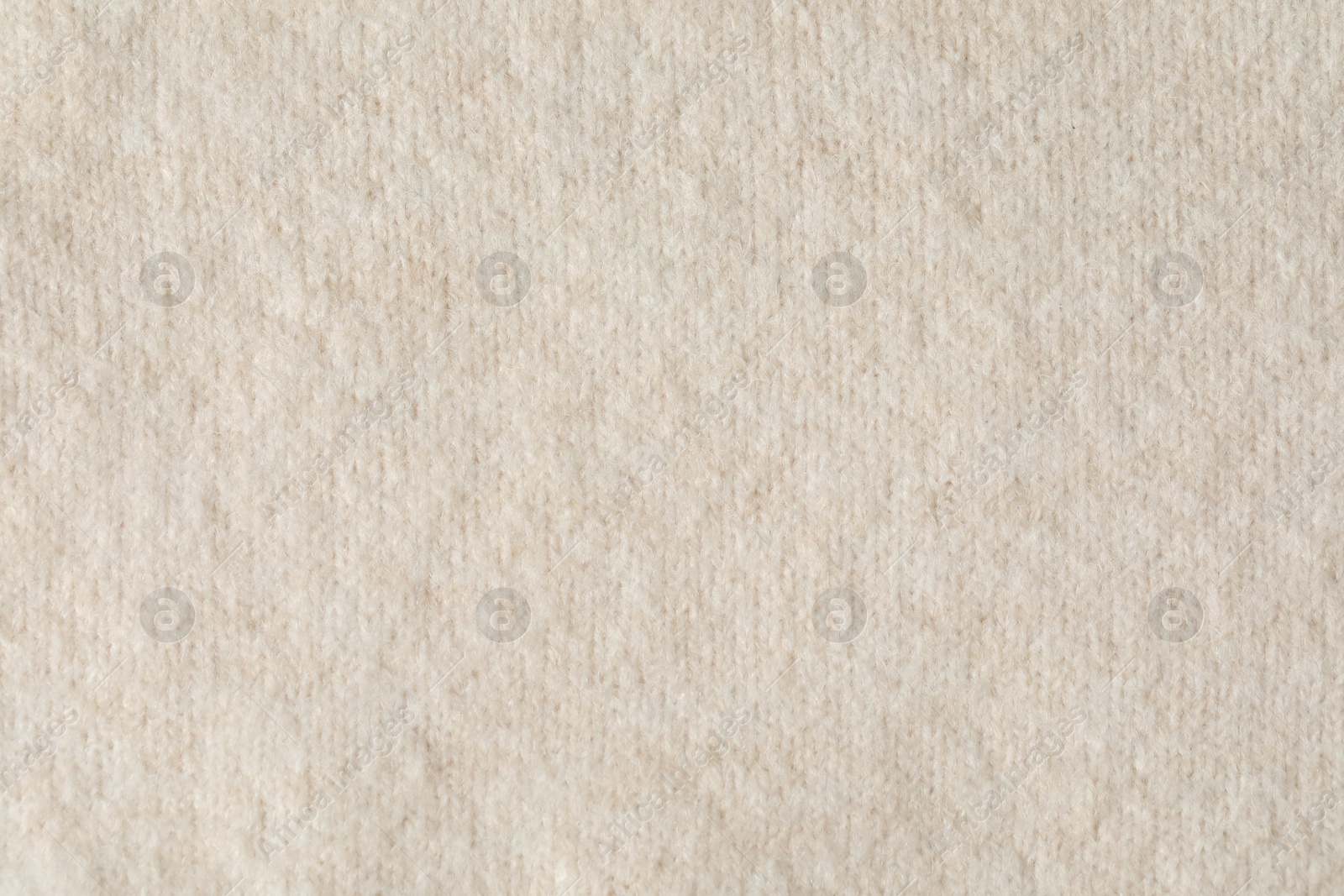 Texture of beige wool fabric as background, top view Photo of Texture of beige wool fabric as background, top view