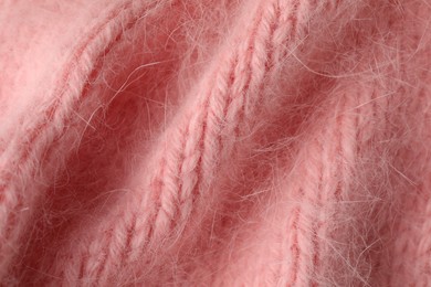 Photo of Texture of pink wool fabric as background, top view