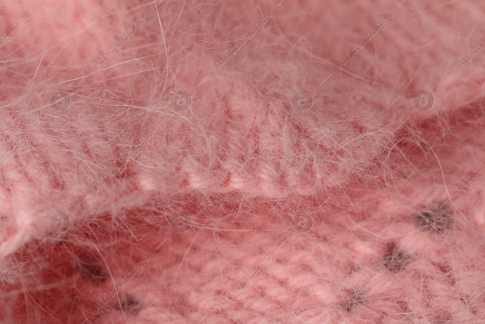 Texture of pink wool fabric as background, closeup Photo of Texture of pink wool fabric as background, closeup