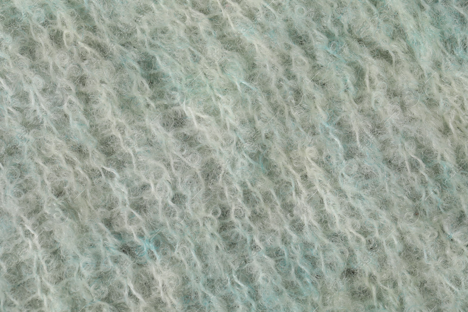 Texture of turquoise wool fabric as background, top view Photo of Texture of turquoise wool fabric as background, top view