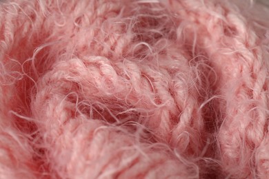 Photo of Texture of pink wool fabric as background, closeup