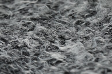 Photo of Texture of grey wool fabric as background, closeup