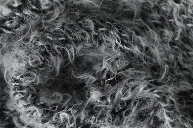 Photo of Texture of grey wool fabric as background, top view